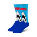 Pair of fuzzy crew socks; blue and light blue with Jaws logo and graphic of two great white sharks emerging from water.