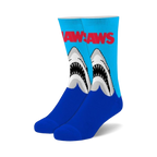 Pair of fuzzy crew socks; blue and light blue with Jaws logo and graphic of two great white sharks emerging from water.