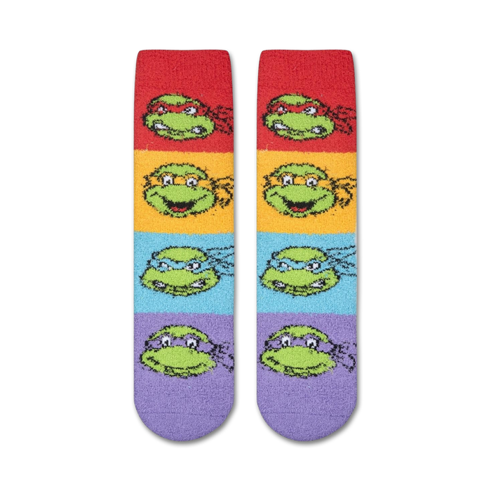 A pair of socks with a pattern of the Teenage Mutant Ninja Turtles on them. The socks are red, orange, yellow, green, blue, and purple.