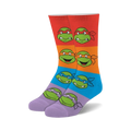 Teenage Mutant Ninja Turtles crew socks.  Multicolored stripes with fuzzy texture, featuring the Turtles' faces.