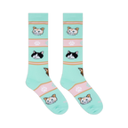 Flat lay of two mint green socks showing black and white cats, orange tabbies, brown cats, and pink stripes with paw prints.