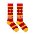 Flatlay product shot of two Cheez-It-themed knee-high socks.