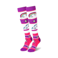 Pair of knee-high socks with white, purple, and pink stripes. Design includes unicorns, rainbows, and colorful gems.