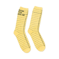 Close-up detail shot of the yellow library card socks, highlighting the texture and design.