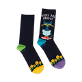 Pair of navy blue crew socks with Pete the Cat reading a book, yellow sunflowers, and colorful accents. 