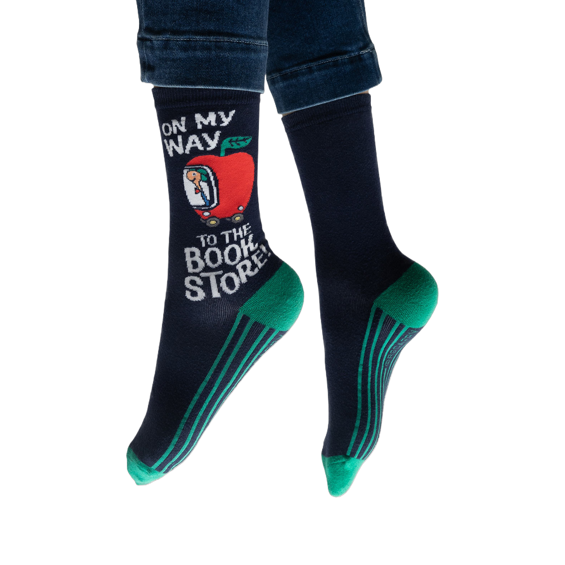 Lifestyle shot: Person wearing navy blue socks with teal stripes and a Richard Scarry apple car design.