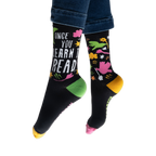 Flatlay image showing both socks laid flat, showcasing the full design.
