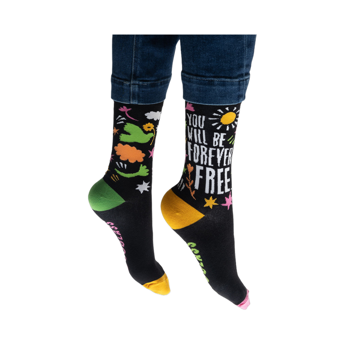 Close-up detail shot focusing on the colored heel and toe of the socks.