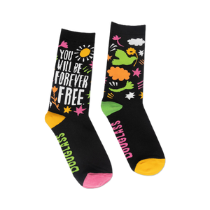 front view of a pair of black adult socks with colorful designs, one sock says 