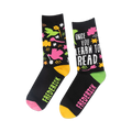 Close-up detail shot of the sock's design, highlighting the playful illustrations and text.
