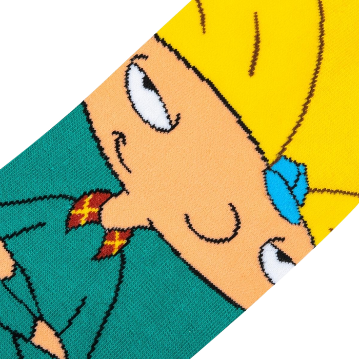 A yellow cartoon character with spiky hair from the 1990s Nickelodeon cartoon Hey Arnold!