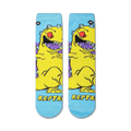 Flat lay showcasing a pair of Rugrats Reptar socks, highlighting the full design.