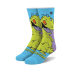Crew socks featuring Reptar from Rugrats.  Yellow and purple Reptar design on a light blue background.