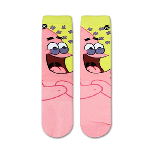 A close up image of a pink and yellow sock with a cartoon character on it. The character has large white eyes with purple eyelids and a wide open mouth.