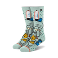 Crew socks in teal and white featuring Squidward Tentacles from Spongebob Squarepants. He's in his work uniform, holding a notebook, on a teal background with white polka dots.