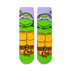 A close up of a sock with the face of Donatello from Teenage Mutant Ninja Turtles. Donatello is a turtle with green skin and a purple mask. He is smiling.