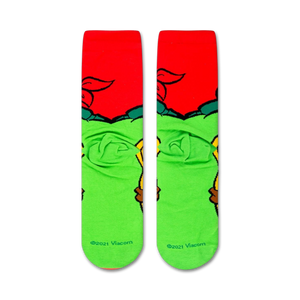 A pair of green and red socks with the Teenage Mutant Ninja Turtles on them.