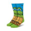 Crew socks in green, blue, and orange. Feature Leonardo from TMNT, his face on the top and his shell on the bottom.