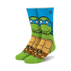 Crew socks in green, blue, and orange. Feature Leonardo from TMNT, his face on the top and his shell on the bottom.