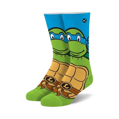 crew-length green socks with a blue cuff. features a pattern of leonardo from teenage mutant ninja turtles. available for men and women.  