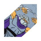 Close-up detail shot of the TMNT Shredder sock design, highlighting Shredder's face and sais.