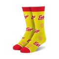 Pair of yellow crew socks with red cuffs.  The socks are covered in Eggo waffle images and logos.