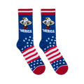 Flat lay of two blue 'Merica socks side by side, clearly showing the muscular flexing eagle, bold text, stars, and stripes.