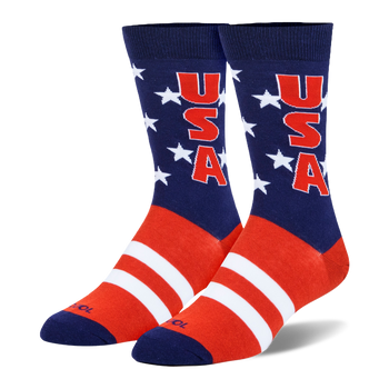 Crew socks with a navy blue leg, white stars, red USA text, and bold red and white stripes covering the foot area.