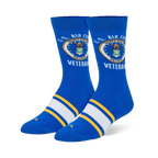 Royal blue crew socks with the US Air Force emblem and Veteran text on the calf, plus white and yellow foot stripes.