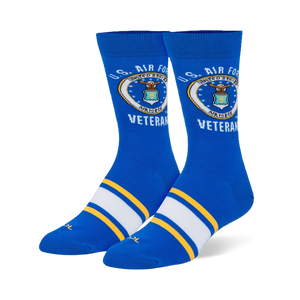 Royal blue crew socks with the US Air Force emblem and Veteran text on the calf, plus white and yellow foot stripes.