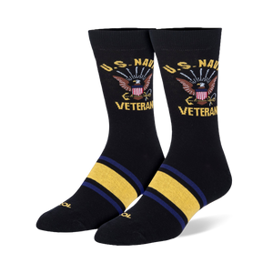 Black crew socks featuring a U.S. Navy Veteran eagle and anchor crest on the leg with yellow and blue stripes on the foot.
