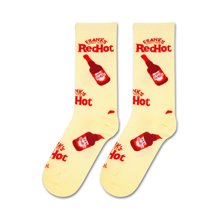 A yellow sock with a red bottle of Frank's RedHot sauce on it.