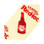 Close-up detail shot of a Frank's RedHot bottle graphic on a cream-colored sock.