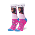 Pair of women's crew socks. Primarily white with pink and blue accents. Features Johnny Depp's Cry-Baby image and a pink teardrop pattern.