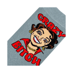 Close-up detail shot focusing on the cartoon woman's face and 'Crazy Bitch' text on the sock.