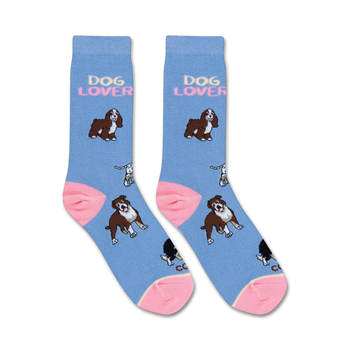 blue and pink women's dog lover crew socks feature a playful cartoon dog pattern.  