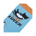 Close-up detail of the sock's fabric and 'Cat Lover' graphic.