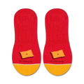 Close-up view of the sole of the Cheez-It no-show socks, showcasing a small graphic of a Cheez-It cracker.