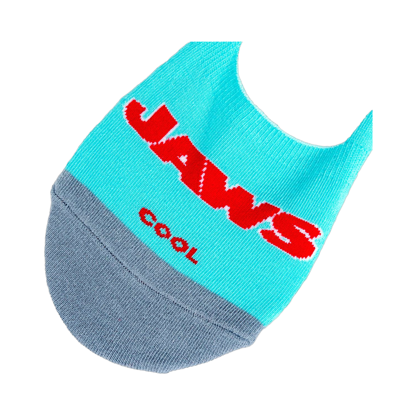 Lifestyle product shot showing a pair of 'Jaws' no-show socks laid flat, displaying both the logo and shark designs.