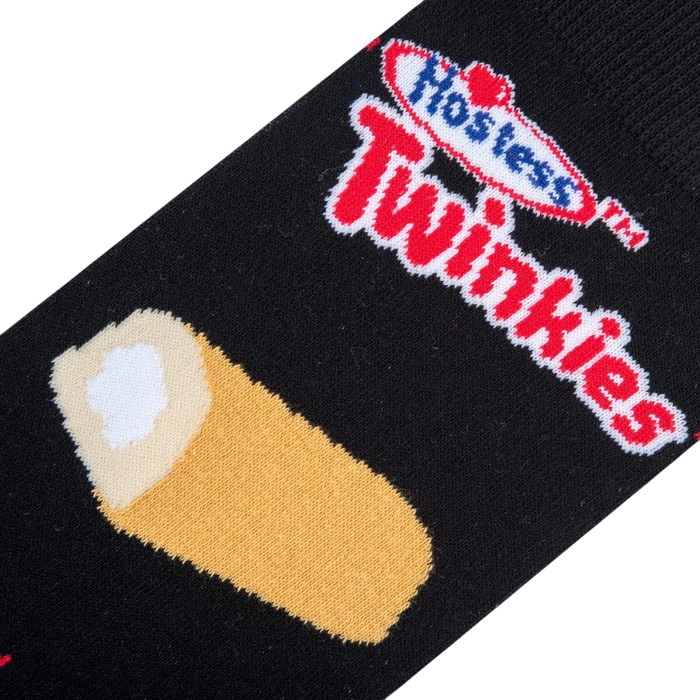 A black sock with a Hostess Twinkie pattern. The pattern features a yellow Twinkie on the lower left side of the sock and a red and white Hostess Twinkies logo on the upper right.