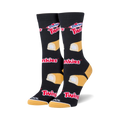 Pair of black crew socks with yellow and white Twinkies and Hostess Twinkies logos.