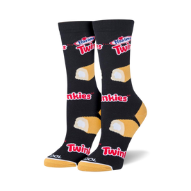 here's some seo-friendly  black crew socks with an allover pattern of yellow hostess twinkies, famous sponge cakes with a creamy filling.  