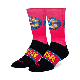 crew-length wheel of fortune socks in black and pink with the show's logo and lettering.  