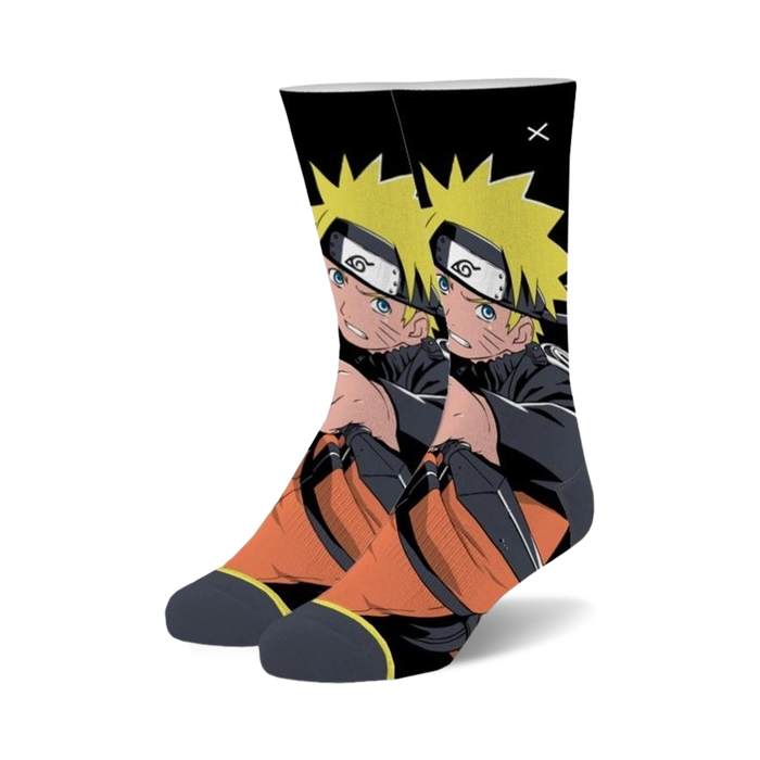 naruto uzumaki socks in black and orange cotton. naruto is sitting on a rock with a kunai in his hand.    }}