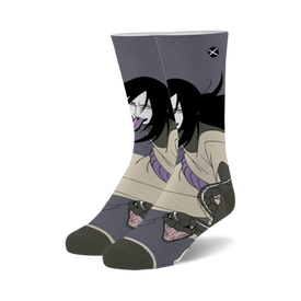 black and gray crew socks feature a pattern of orochimaru from naruto.   