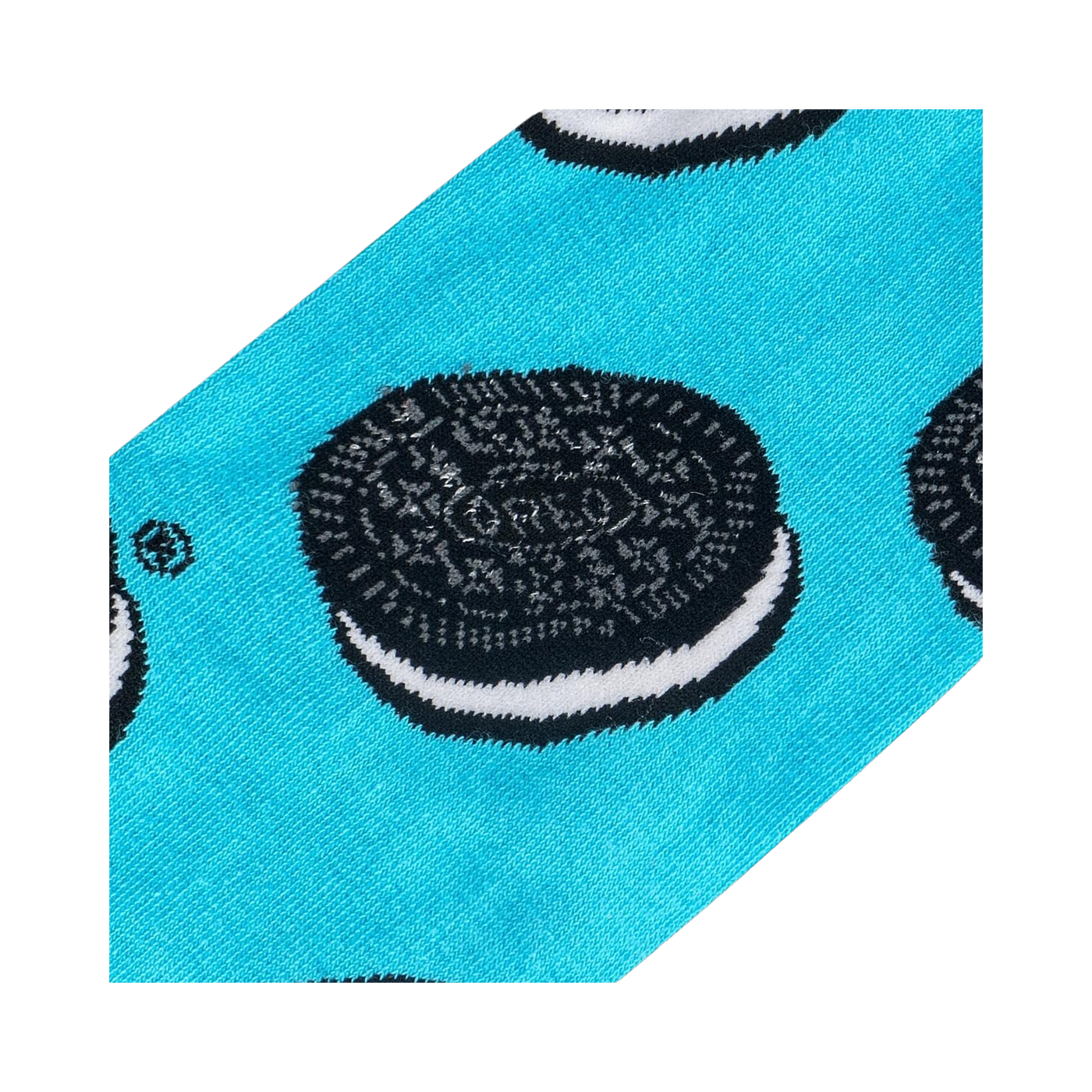 Detailed close-up shot of the Oreo cookie design on the sock fabric.