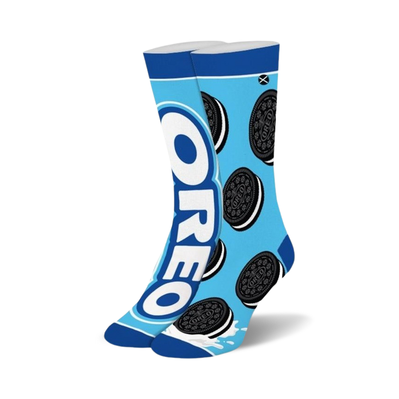 Pair of crew socks in teal blue, featuring a graphic design of Oreo cookies and the Oreo logo. 