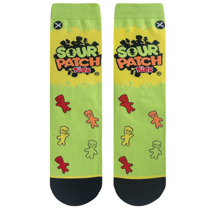 Flat lay of two Sour Patch Kids crew socks, front view, showing logo and candy figures on lime green and yellow.