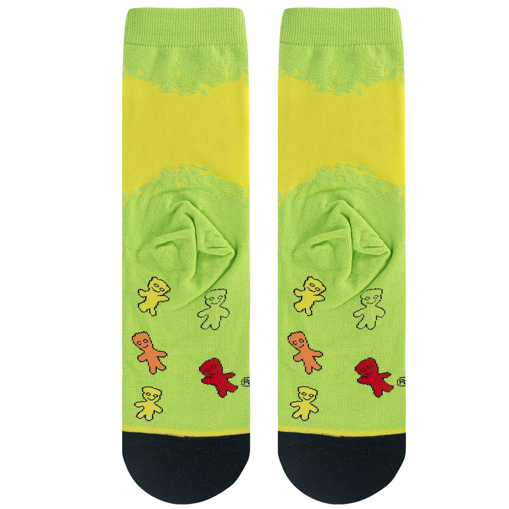 Close-up shot of the Sour Patch Kids socks, focusing on the detailed gummy candy characters on a lime green background.