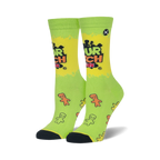 Pair of women's crew socks in lime green.  Features Sour Patch Kids logo and scattered gummy character designs.